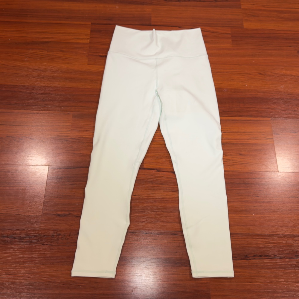 Fabletics PowerHold High-Waisted Leggings in Mint Green, Size M.